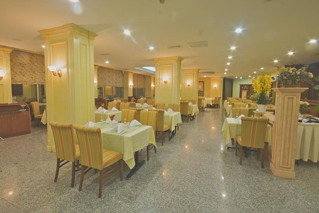 اسطنبول Grand Medya Hotel المطعم الصورة
